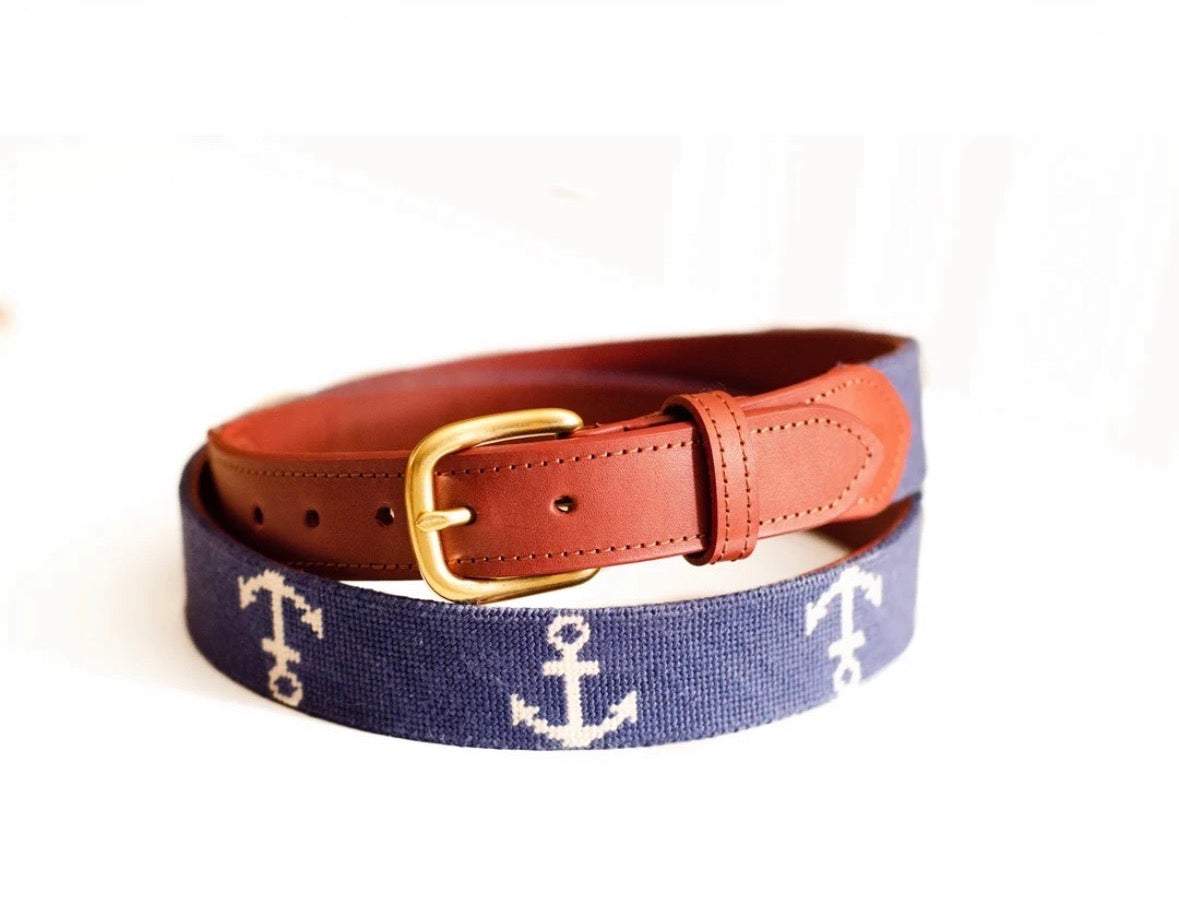 Navy needlepoint belt with white anchors and brown leather buckle strap