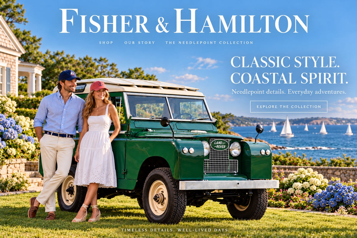 Fisher and Hamilton coastal style with a couple beside a green Land Rover